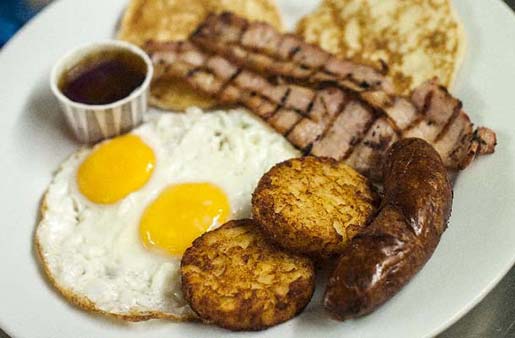 American breakfast with hashbrown rounds